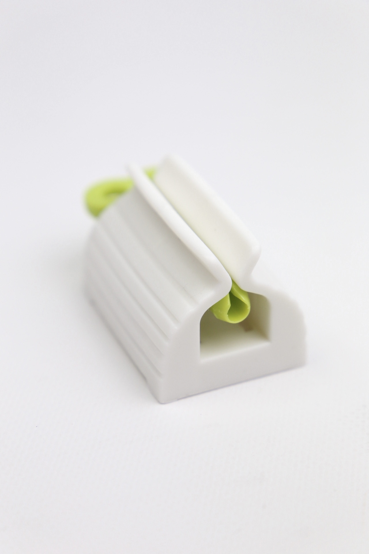 картинка Пресс для зубной пасты и крема, зеленый от магазина Pratik