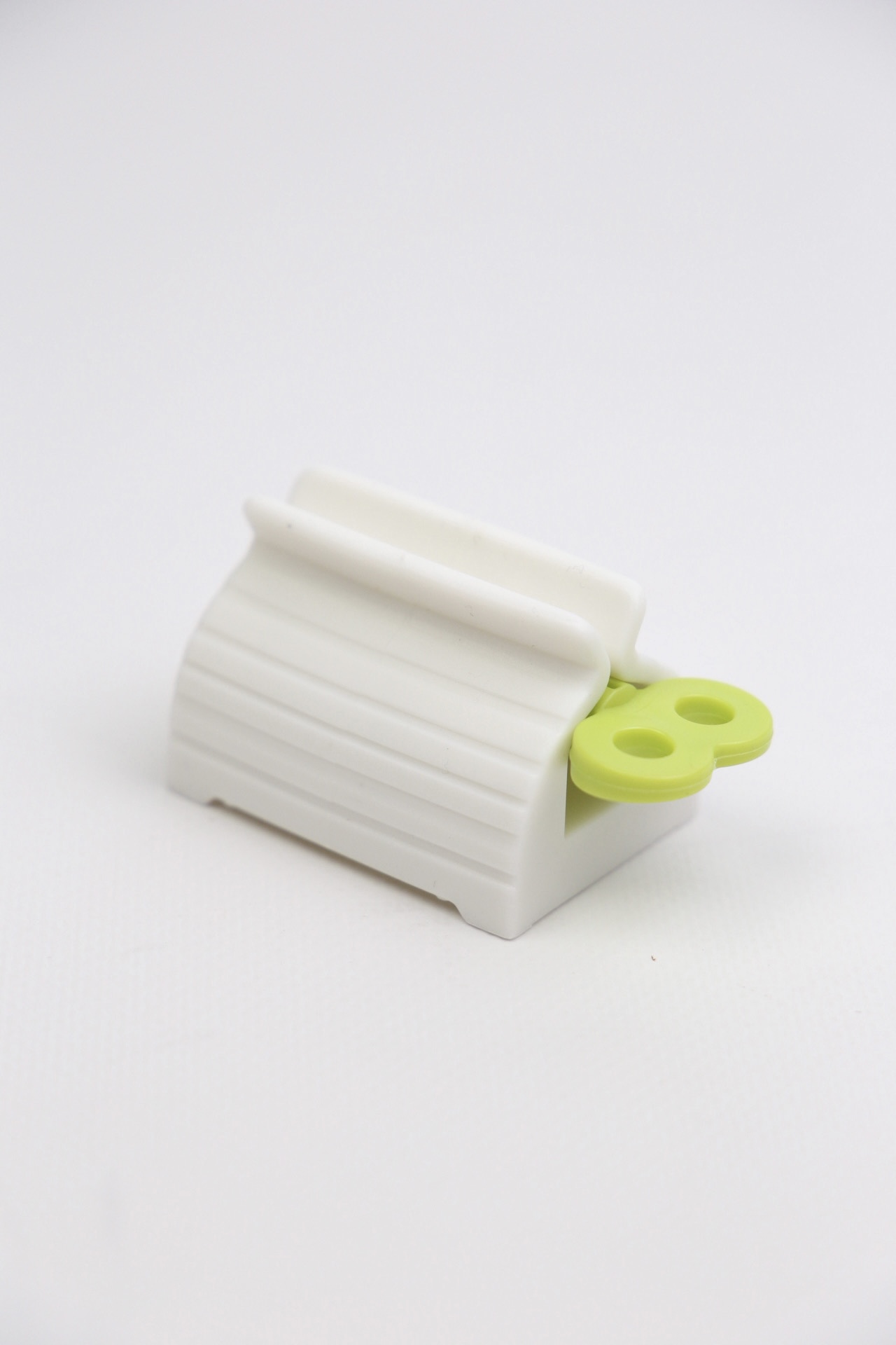 картинка Пресс для зубной пасты и крема, зеленый от магазина Pratik