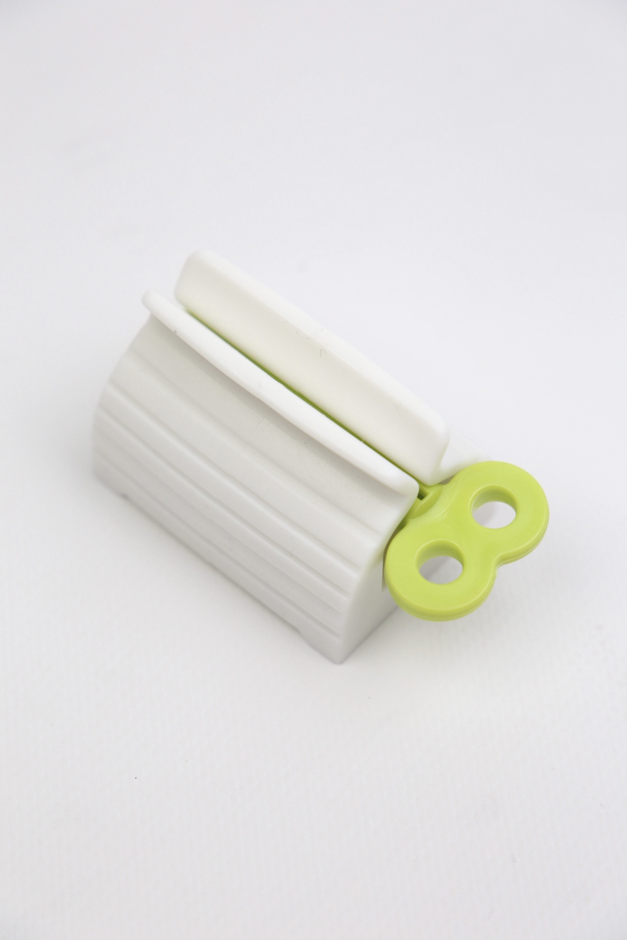 картинка Пресс для зубной пасты и крема, зеленый от магазина Pratik